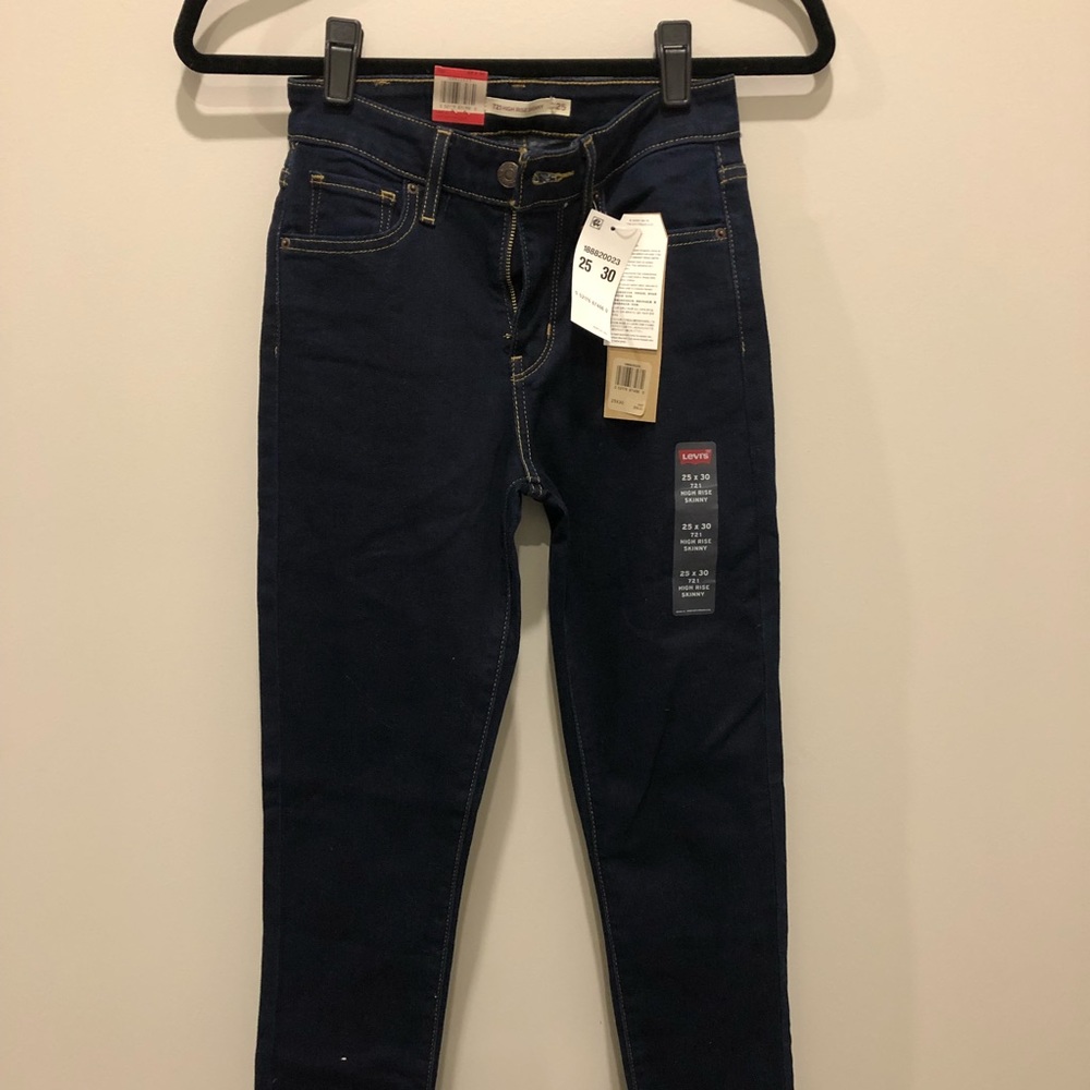 721 High Rise and Skinny Levi Jeans 25
